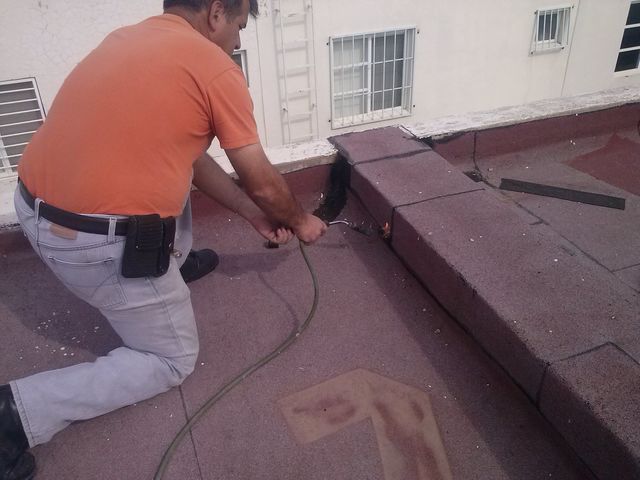 Reparando azotea